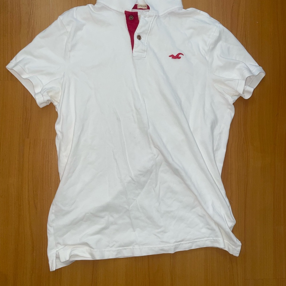 White Polo Shirt with Red Logo